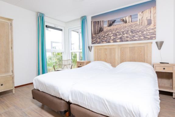 Slaapkamer van een bungalow | Strandpark Duynhille